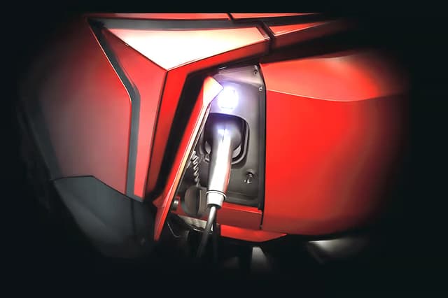 Exterior XEV 9e-gas-cap-(open).avif