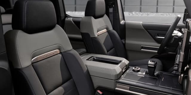 Interior hummer-ev-driver side view.webp