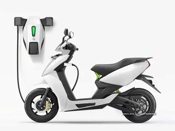 https://s3.ap-south-1.amazonaws.com/evfy.bucket1/scooter charging.jpeg